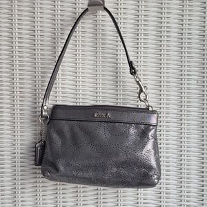 Coach Perforated Signature Wristlet In Gunmetal Silver